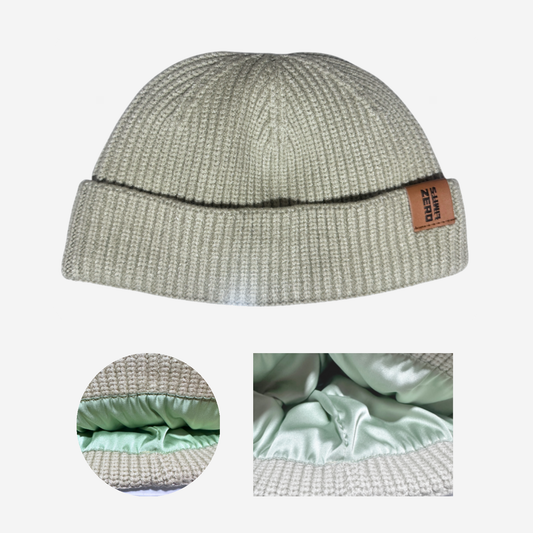 Sage Locked In satin-lined fisherman beanie, front view with two close-up details of its mint satin lining.